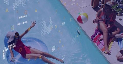 Reclining woman on inflatable ring in pool with beach ball
