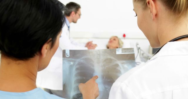 Doctors Examining Chest X-ray in Hospital Room - Download Free Stock Images Pikwizard.com