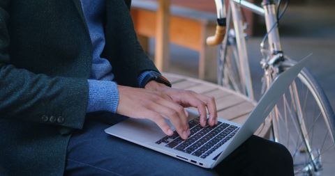 Businessman Uses Laptop Outdoors Near Bicycle During Break - Download Free Stock Images Pikwizard.com