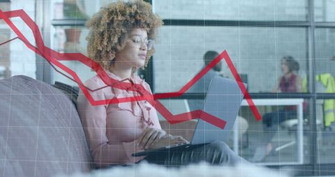 focused businesswoman analyzing financial graph on laptop - Download Free Stock Images Pikwizard.com