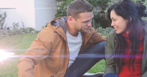 Happy Couple Enjoying Outdoor Magic Moment on Suburban Lawn