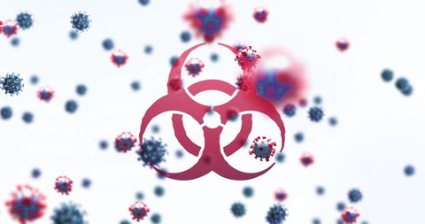 Coronavirus cells with biohazard and dna concept overlay
