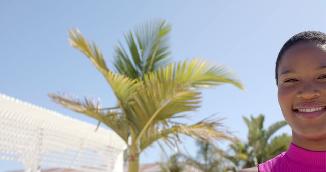 Woman Enjoying Sunny Day by Tropical Palm Tree - Download Free Stock Images Pikwizard.com