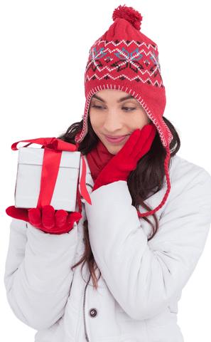 Brunette Woman in Winter Attire Admiring Gift Transparent
