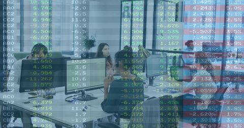 Professionals Analyzing Data in Modern Office Setting