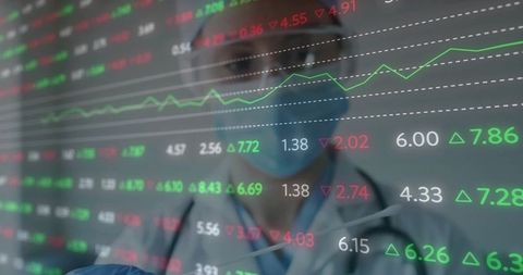 Medical Professional Analyzing Data on Future of Healthcare Analytics