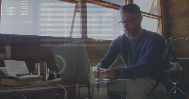  Businessman Analyzing Financial Data on Laptop in Cozy Cabin Workspace - Download Free Stock Images Pikwizard.com