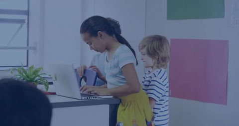 Girl Using Laptop in Classroom Collaborative Learning Environment