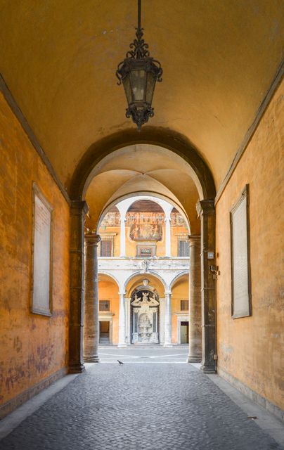 Historic Archway Leading to Roman Courtyard with Statue - Download Free Stock Images Pikwizard.com