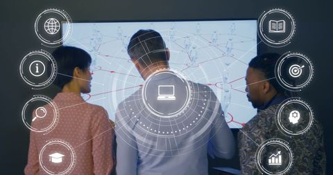 Diverse Business Team Discussing Digital Interface and Strategy