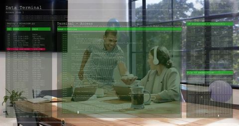 Coworkers collaborating with augmented reality terminal overlay in sunlit modern workspace