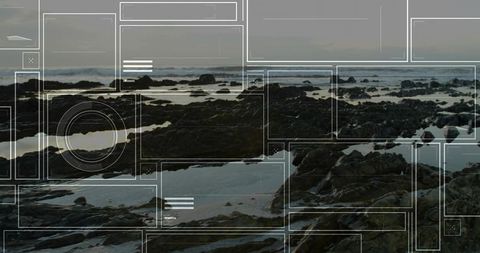 Serene rocky shoreline with tide pools at dusk