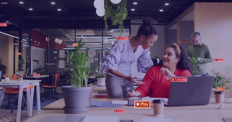 Diverse Team Collaborating in Modern Office with Social Media Overlay