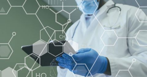 Doctor reviewing medical updates on digital tablet with laboratory structure illustrations