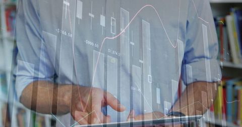 Mid-Adult Man Analyzing Financial Data on Tablet in Home Office - Download Free Stock Images Pikwizard.com