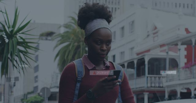 Young African Woman Using Smartphone on Urban Street - Download Free Stock Images Pikwizard.com