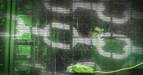 Asian Hacker Analyzing Data in High-Tech Server Room - Download Free Stock Images Pikwizard.com