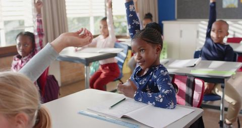 Curious Young Students Participating in Classroom
