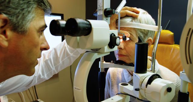 Optometrist Examining Senior Woman's Eyes with Slit Lamp - Download Free Stock Images Pikwizard.com