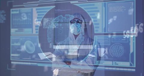 Scientist in ppe analyzing complex data interfaces
