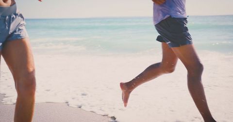 Joyful Jogging on Sunny Beach Representing Active Lifestyle