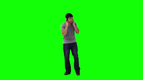 Man Dancing with Headphones on Green Screen Background
