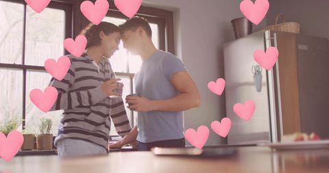 Loving Gay Couple Enjoying Coffee in Cozy Kitchen with Heart Overlay