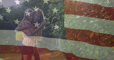 Mother and Daughter Embracing in Garden with Patriotic Overlay