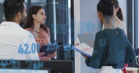 Multinational Business Team Discussing Stock Market Trends