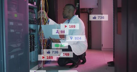 Engineer Managing Data Servers with Social Media Overlays - Download Free Stock Images Pikwizard.com
