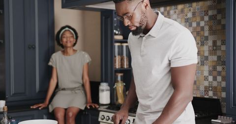 Couple Sharing Moment Together in Kitchen