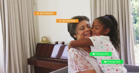 Granddaughter Hugging Grandmother in Cozy Living Room with Digital Overlays
