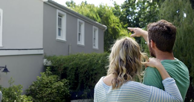 Couple Discussing Home Renovation Plans Outdoors - Download Free Stock Images Pikwizard.com