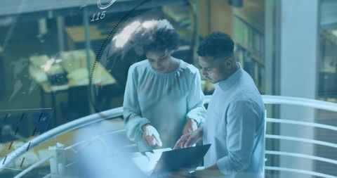 Business Professionals Reviewing Data on Laptop