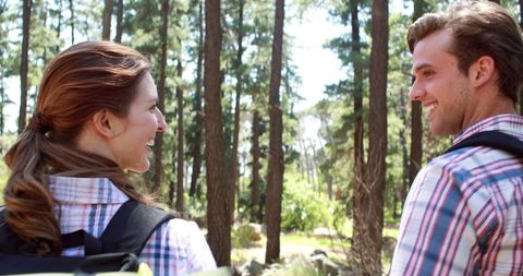 Couple Enjoying a Forest Hike Together in Nature