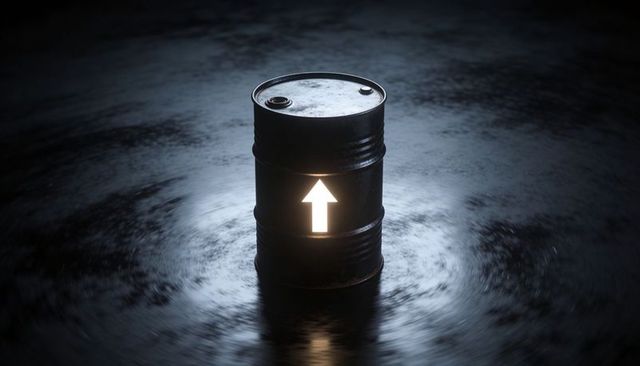 Glowing Industrial Oil Drum with Upward Arrow Cutout on Reflective Wet Floor