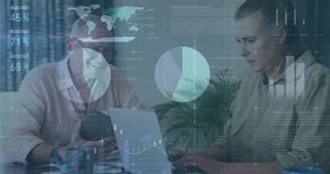 Senior Couple Analyzing Financial Data and Technology Trends