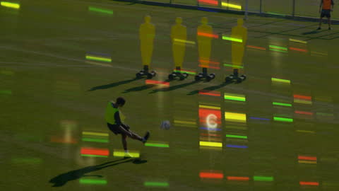 Football Player Practicing Shots with Digital Interface Overlay