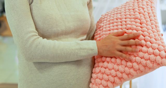 Pregnant Woman Holding Soft Textured Pink Pillow - Download Free Stock Images Pikwizard.com