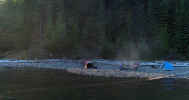 Remote Lakeside Campsite with Tents and Campfire - Download Free Stock Images Pikwizard.com