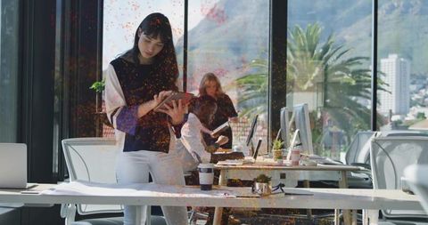 Modern open office space with women collaborating