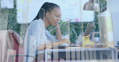 Businesswoman Analyzing Data with Office Technology Overlay - Download Free Stock Images Pikwizard.com