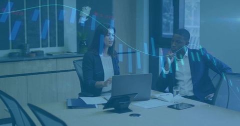 Corporate Professionals Analyzing Financial Data in Office Meeting