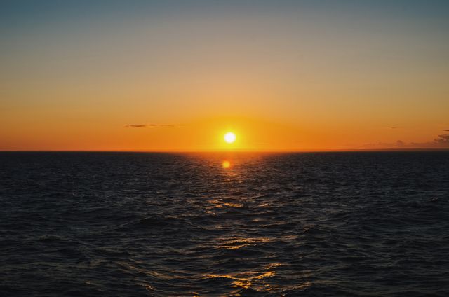Golden Sunset Over Calm Ocean Horizon - Download Free Stock Photos Pikwizard.com