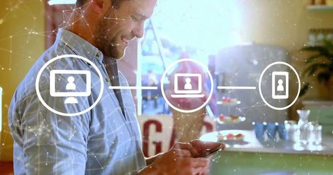 Connected Lifestyle: Man Networking in Modern Kitchen