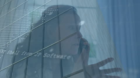 Double Exposure: Woman on Phone and Digital Data Overlay