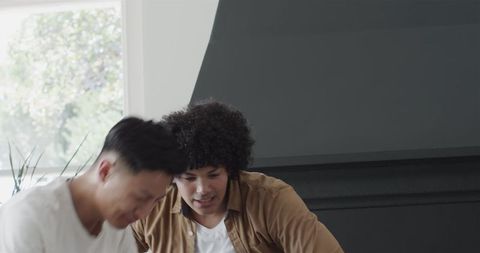 Friends Bonding Over Drinks in Comfortable Home Setting