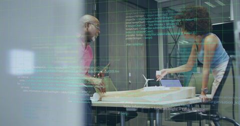 Business Professionals Collaborating with Data Overlay