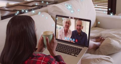Family video call amid holiday season snowfall