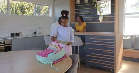 Family Morning Routine in Modern Kitchen